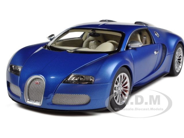   model car of bugatti eb veyron 16 4 bleu centenaire 2009 by autoart