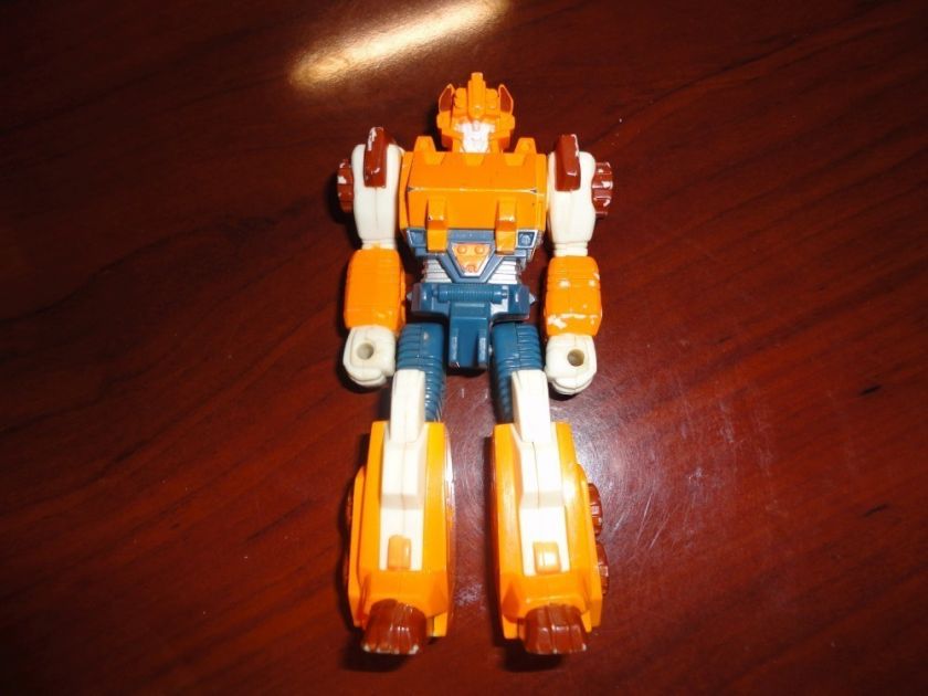   1989 Hasbro Takara Macau   Orange/Blue/White/Brown Transformer  