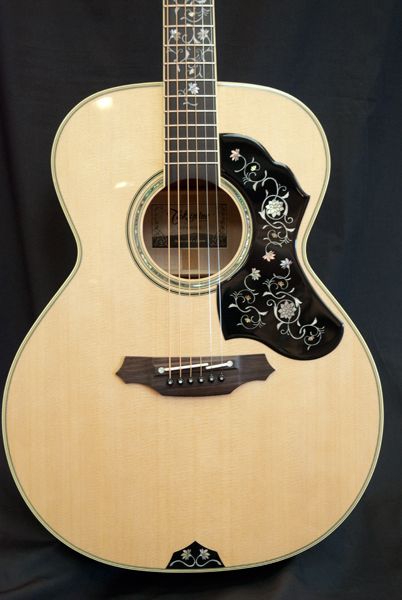  guitar features a NEX body with a natural High Gloss finish 