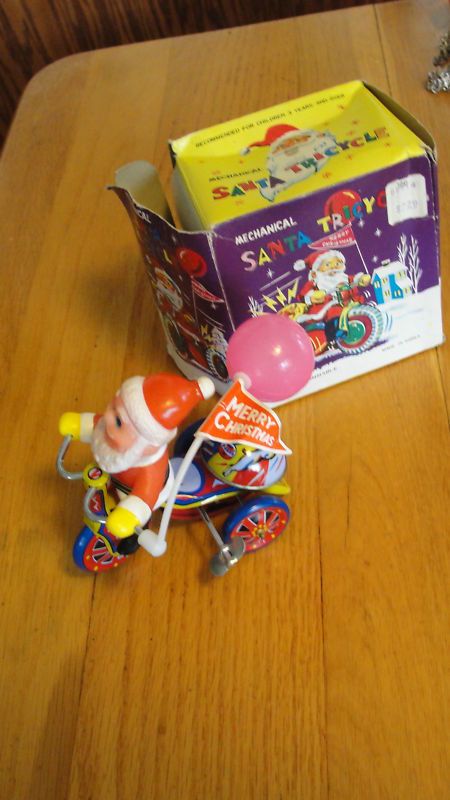 IN THE BOX MECHANINCAL SANTA TRICYCLE TIN WIND UP TOY  